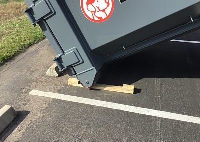Boards Protect Driveway Dumpster Delivery